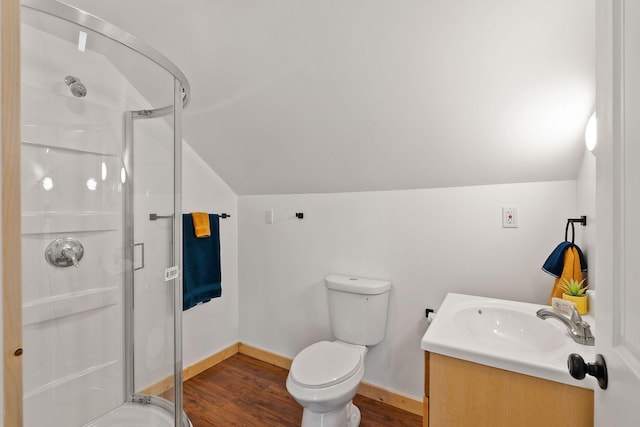 1380 Lower Valley Rd, Kalispell, MT 59901 - full bath with vaulted ceiling, a stall shower, vanity, and wood finished floors