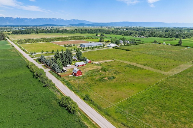1380 Lower Valley Rd, Kalispell, MT 59901 - aerial view of sparsely populated area with a mountain backdrop and abundant farmland
