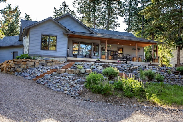 33731 Westview Dr, Bigfork, MT 59911 - rear view of property featuring a shingled roof