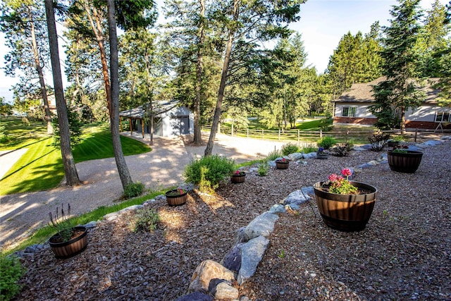 33731 Westview Dr, Bigfork, MT 59911 - view of yard featuring an outbuilding