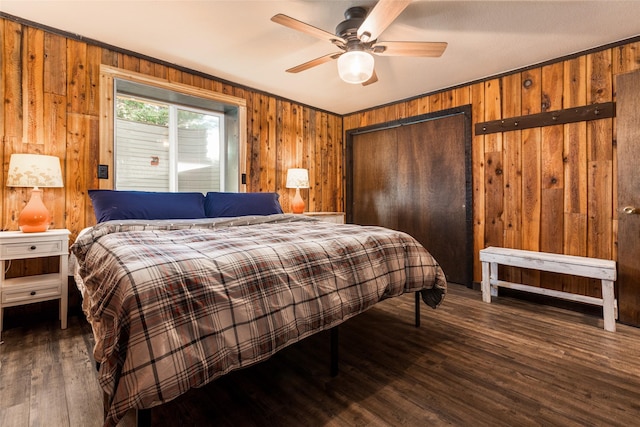 630 Tally Lake Rd, Whitefish, MT 59937 - bedroom featuring wood finished floors, wood walls, and a ceiling fan