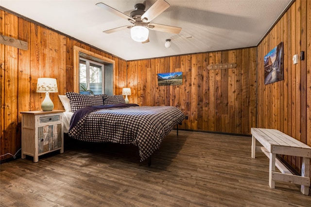 630 Tally Lake Rd, Whitefish, MT 59937 - bedroom with wood finished floors and wooden walls