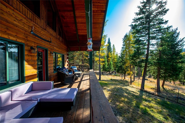 630 Tally Lake Rd, Whitefish, MT 59937 - wooden deck featuring outdoor lounge area