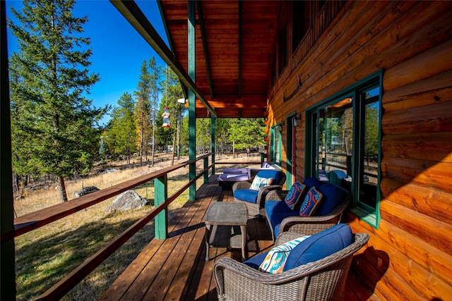 630 Tally Lake Rd, Whitefish, MT 59937 - wooden terrace featuring an outdoor hangout area
