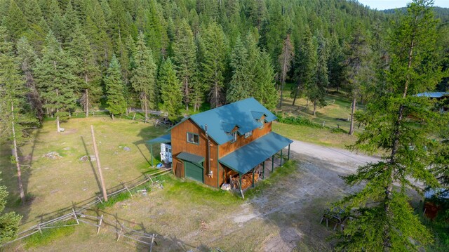 630 Tally Lake Rd, Whitefish, MT 59937 - view from above of property with a heavily wooded area
