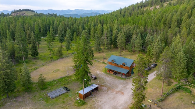 630 Tally Lake Rd, Whitefish, MT 59937 - aerial view of property and surrounding area featuring a mountainous background and a forest