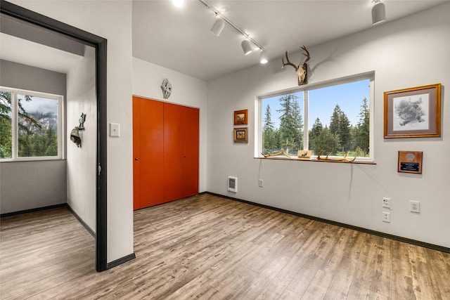 630 Tally Lake Rd, Whitefish, MT 59937 - entrance foyer with wood finished floors and rail lighting