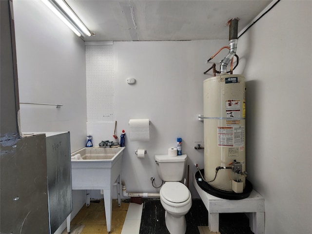 1208 8th Ave NW, Great Falls, MT 59404 - bathroom with gas water heater and toilet