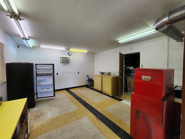 1208 8th Ave NW, Great Falls, MT 59404 - basement featuring an AC wall unit, washer and dryer, freestanding refrigerator, and inlaid floor details