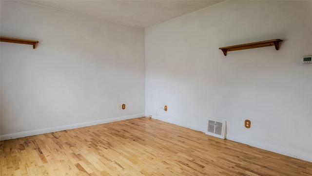 1220 Cannon St, Helena, MT 59601 - unfurnished room with wood finished floors and baseboards