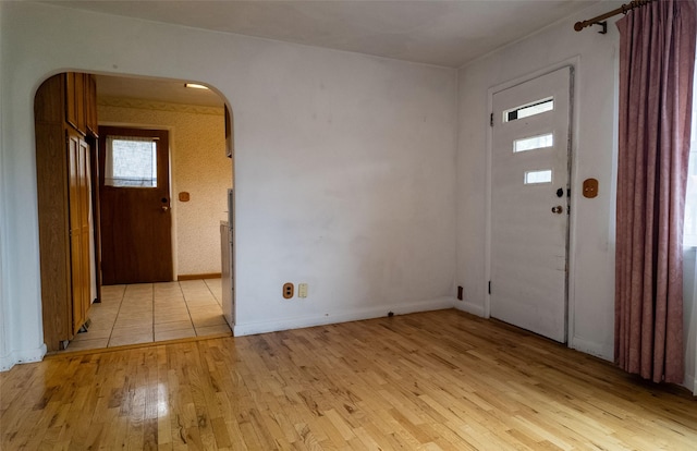 1220 Cannon St, Helena, MT 59601 - foyer with arched walkways and light wood-style floors