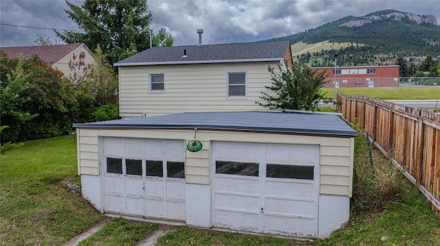 1220 Cannon St, Helena, MT 59601 - garage featuring a mountain view