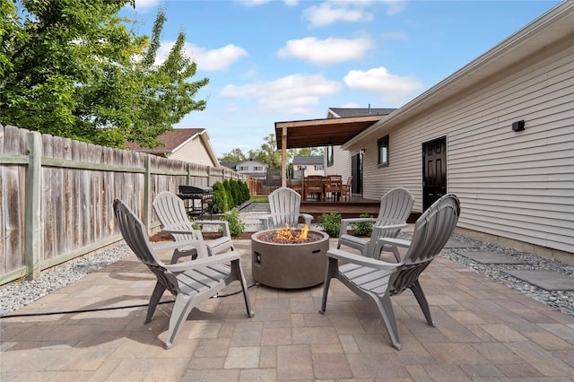 301 Buttercup Loop, Kalispell, MT 59901 - view of patio / terrace featuring an outdoor fire pit