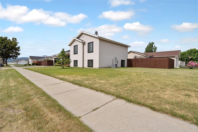 301 Buttercup Loop, Kalispell, MT 59901 - view of side of property with a central air condition unit