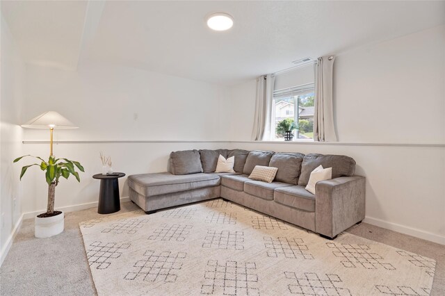 301 Buttercup Loop, Kalispell, MT 59901 - carpeted living room featuring baseboards