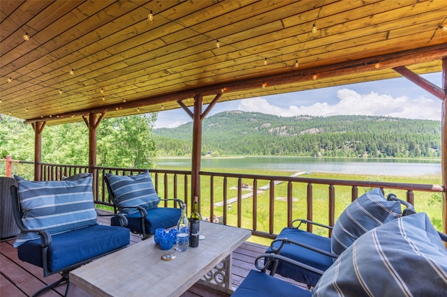 2755 US Highway 93 W, Whitefish, MT 59937 - wooden terrace with a forest view and a water view