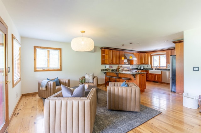 2755 US Highway 93 W, Whitefish, MT 59937 - living area with light wood-style flooring and baseboards