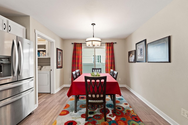 64 Empire Loop, Kalispell, MT 59901 - dining room with independent washer and dryer and light wood-style floors