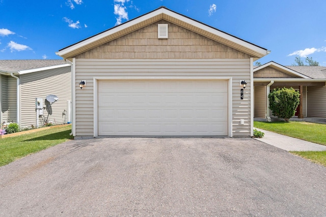 64 Empire Loop, Kalispell, MT 59901 - view of front of home with driveway and a garage