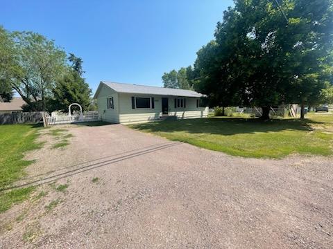 609 11th Ave E, Polson, MT 59860 - view of front of home with driveway