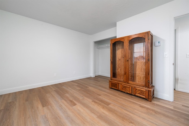 609 11th Ave E, Polson, MT 59860 - unfurnished bedroom with light wood-style floors