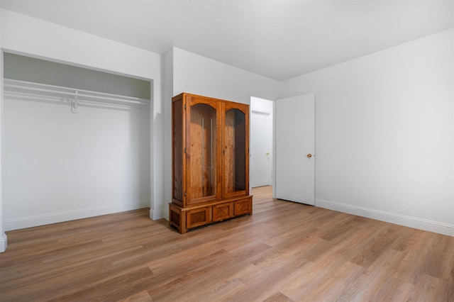 609 11th Ave E, Polson, MT 59860 - unfurnished bedroom with light wood-type flooring