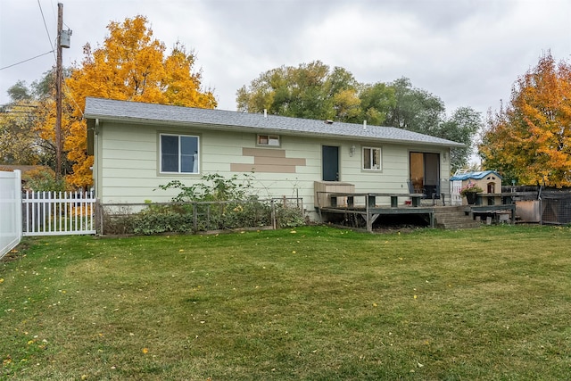 609 11th Ave E, Polson, MT 59860 - back of house featuring a wooden deck