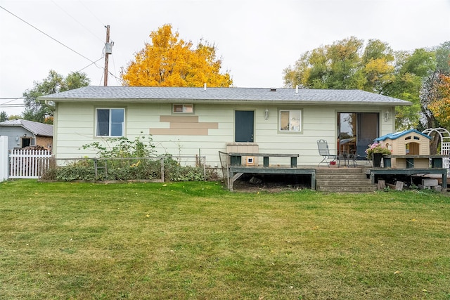 609 11th Ave E, Polson, MT 59860 - back of property featuring a wooden deck