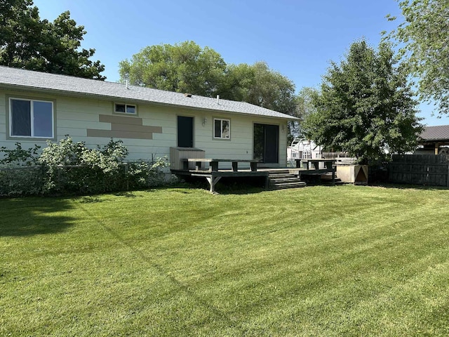 609 11th Ave E, Polson, MT 59860 - back of property featuring a deck