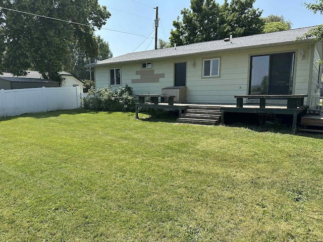 609 11th Ave E, Polson, MT 59860 - rear view of property with a wooden deck