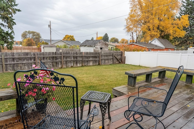 609 11th Ave E, Polson, MT 59860 - fenced backyard with a deck