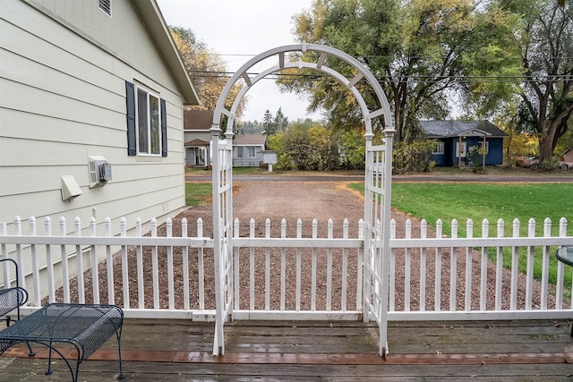 609 11th Ave E, Polson, MT 59860 - wooden deck featuring a fenced front yard