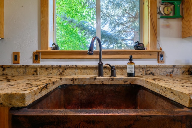 192 Leonard Ln, Eureka, MT 59917 - kitchen view of a sink and light stone counters