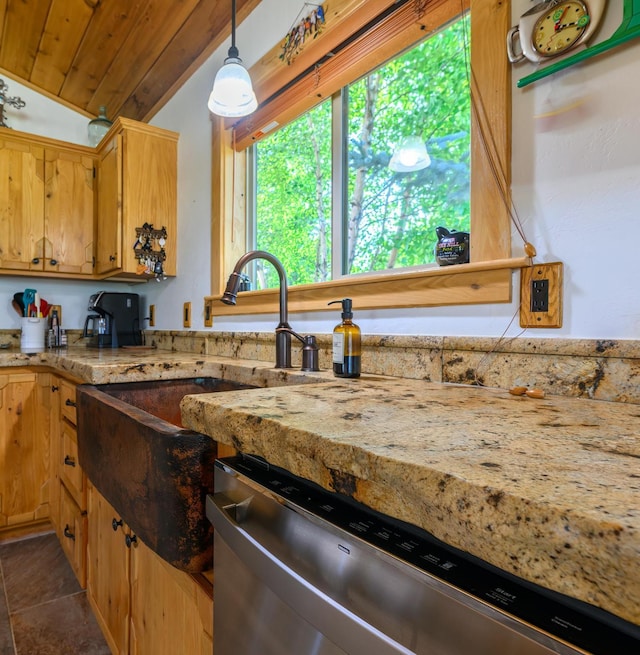 192 Leonard Ln, Eureka, MT 59917 - kitchen featuring dishwasher, decorative light fixtures, light stone counters, dark tile patterned flooring, and lofted ceiling
