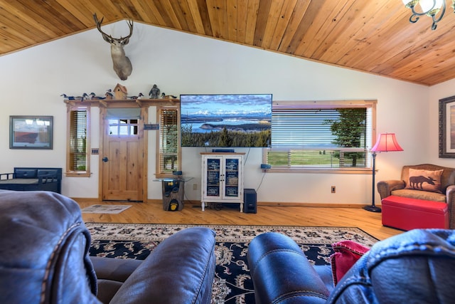 192 Leonard Ln, Eureka, MT 59917 - living room featuring vaulted ceiling, healthy amount of natural light, wood ceiling, and wood finished floors