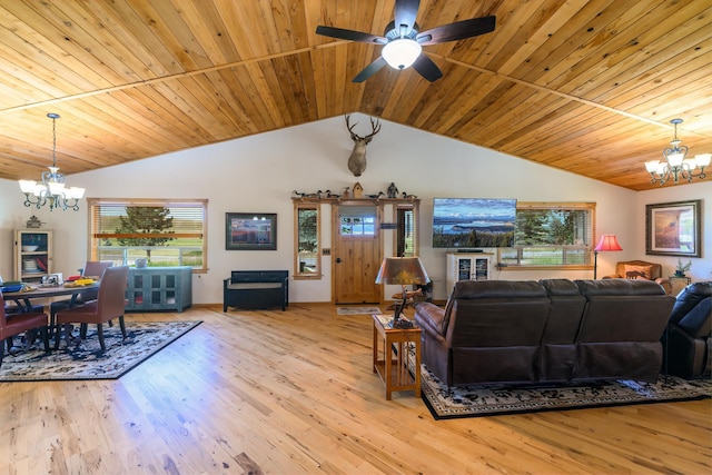 192 Leonard Ln, Eureka, MT 59917 - living area featuring a chandelier, wooden ceiling, vaulted ceiling, wood finished floors, and plenty of natural light