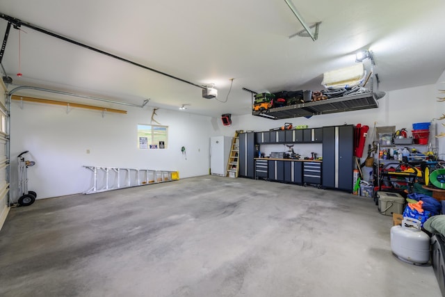 192 Leonard Ln, Eureka, MT 59917 - garage featuring a garage door opener