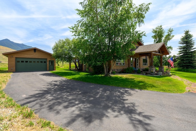 192 Leonard Ln, Eureka, MT 59917 - view of front of home with a front yard and driveway