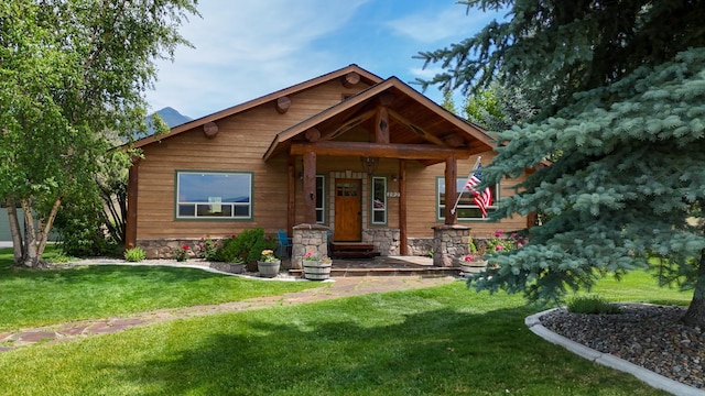 192 Leonard Ln, Eureka, MT 59917 - view of front of property featuring a front yard and stone siding