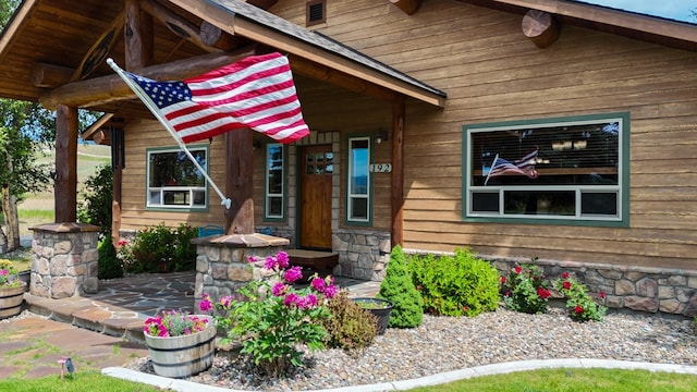 192 Leonard Ln, Eureka, MT 59917 - view of exterior entry with covered porch