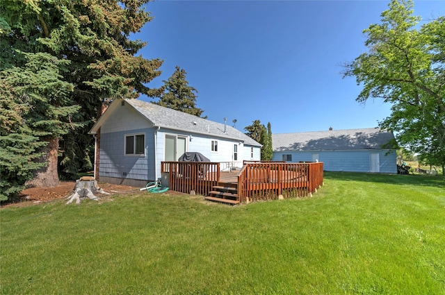 232 Kurtz Ln, Hamilton, MT 59840 - rear view of property featuring a deck and a lawn