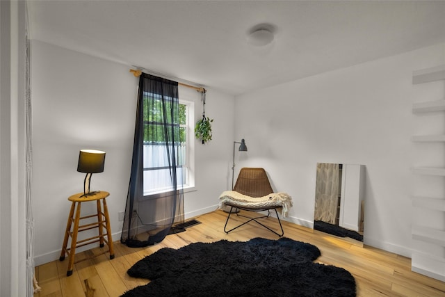 438 Somers Ave, Whitefish, MT 59937 - living area featuring wood finished floors and baseboards