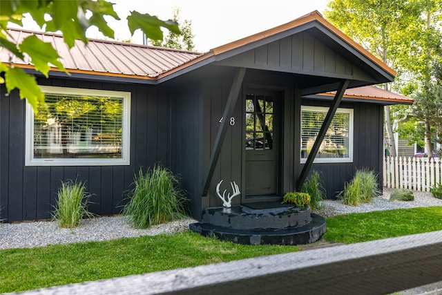 438 Somers Ave, Whitefish, MT 59937 - doorway to property with a metal roof