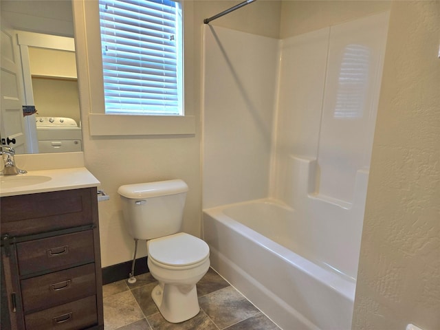 138 Jewel Basin Ct, Bigfork, MT 59911 - full bath featuring washer / clothes dryer, vanity, and shower / washtub combination