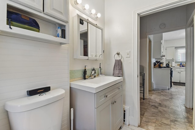 3120 1st Ave N, Great Falls, MT 59401 - bathroom featuring vanity and decorative backsplash