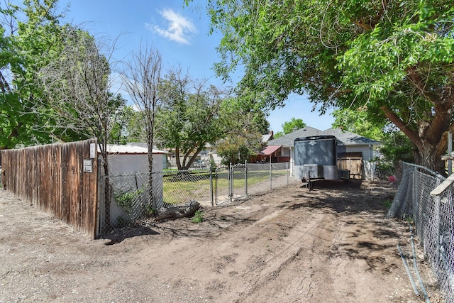 3120 1st Ave N, Great Falls, MT 59401 - view of dirt / gravel driveway featuring a gate