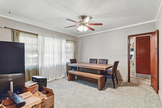 3120 1st Ave N, Great Falls, MT 59401 - dining space featuring a ceiling fan, carpet flooring, and ornamental molding