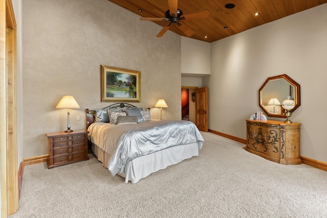 639 Three Eagle Ln, Bigfork, MT 59911 - carpeted bedroom with wooden ceiling and a ceiling fan