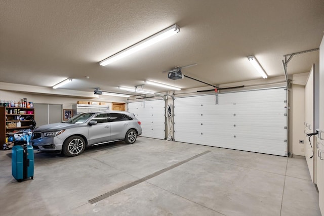 639 Three Eagle Ln, Bigfork, MT 59911 - garage featuring a garage door opener
