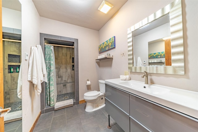 439 Osborn Ave Unit 115, Bigfork, MT 59911 - full bathroom with vanity, a stall shower, and tile patterned floors